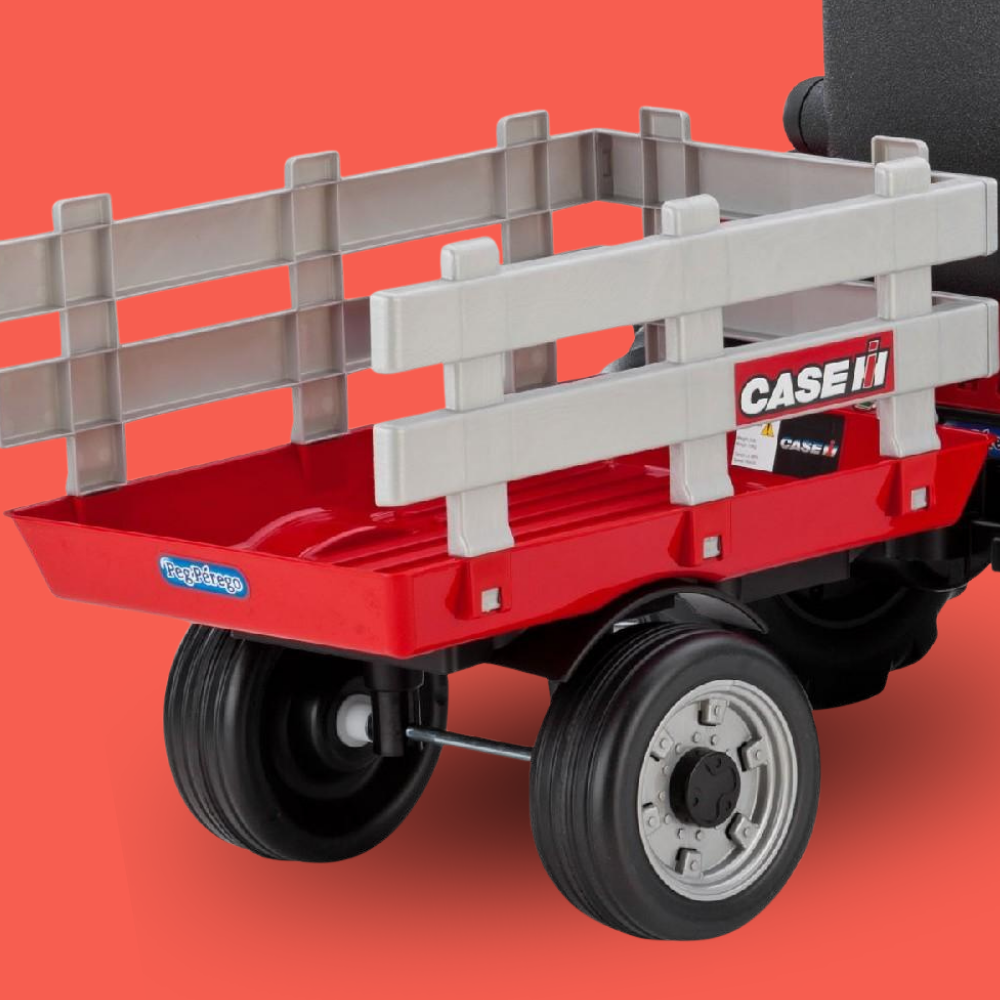 Red toy wagon with gray bed and visible branding on a red background