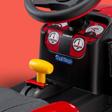 Toy tractor steering wheel and dashboard with Peg Perego branding on a red background