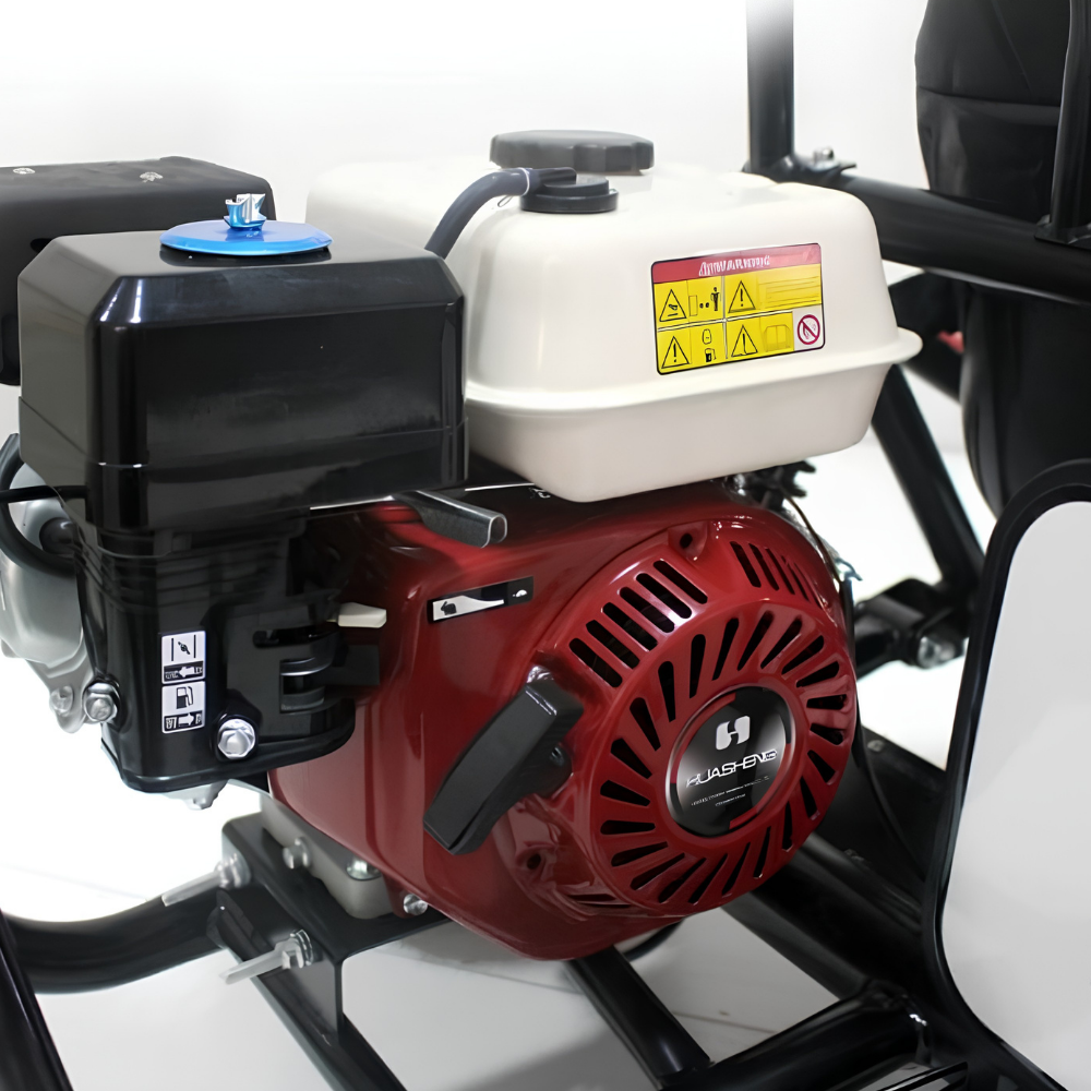 A close-up of a red and black FLAD-EC gasoline engine mounted on a black frame, with a white plastic fuel tank and warning label visible.