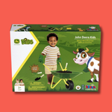 John Deere Kids Metal Wheelbarrow with accessories toy set in its retail packaging, shown against a solid red background.