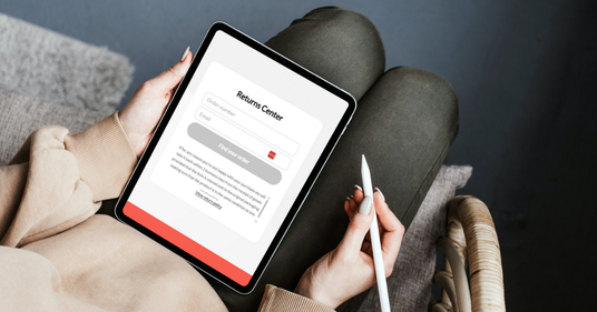 Person using a tablet with a returns centre app