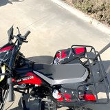 Motorcycle with red and black design on a concrete surface