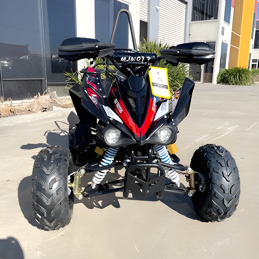 ATV parked in a parking lot with a building in the background