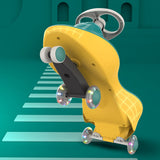 A side-angle image of the yellow ride-on toy, focusing on its dynamic design, wheels, and ergonomic contours.