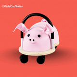 A pink pig-shaped ride-on toy with a wooden base, black handle, and caster wheels on a red background.