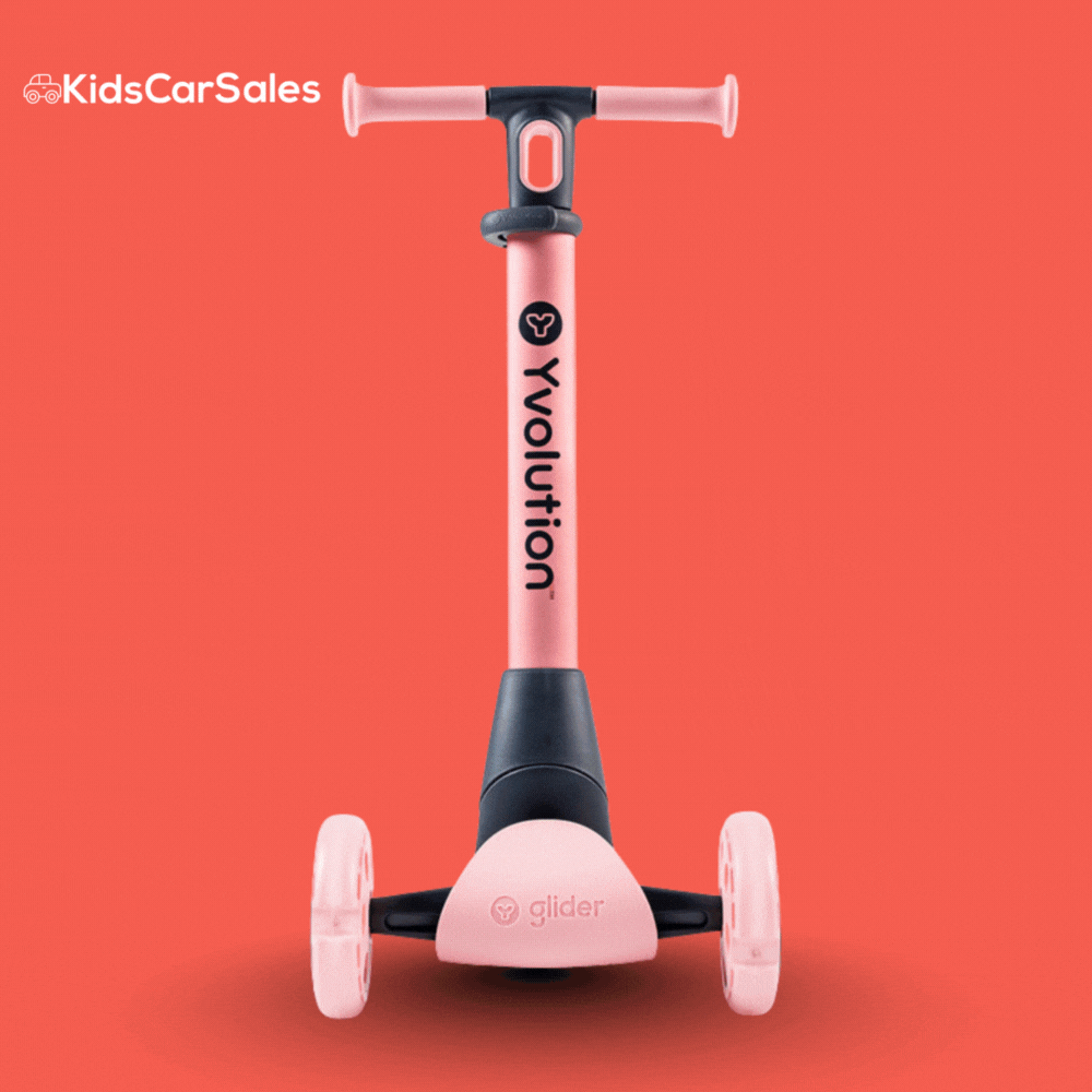 A pink Yvolution Glider Nua 3-wheel kids scooter shown against a solid red background.