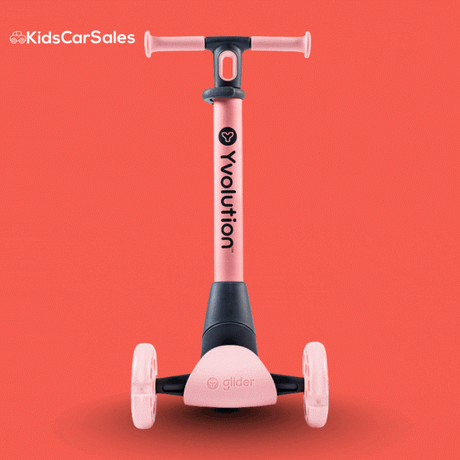 A pink Yvolution Glider Nua 3-wheel kids scooter shown against a solid red background.