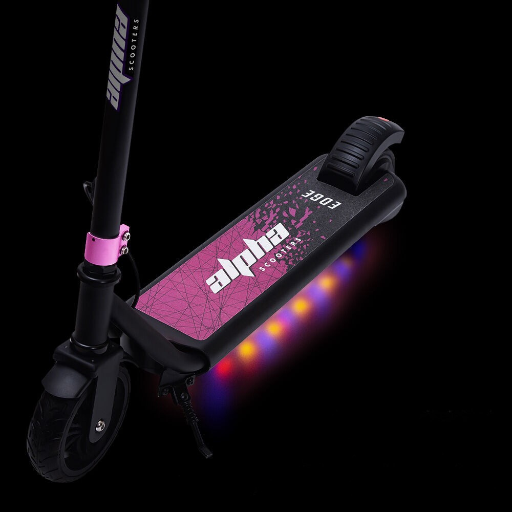 Alpha scooter with pink deck and LED lights on a black background