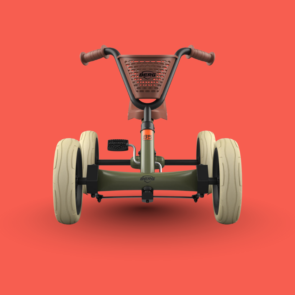 Children's pedal-go-kart on a red background