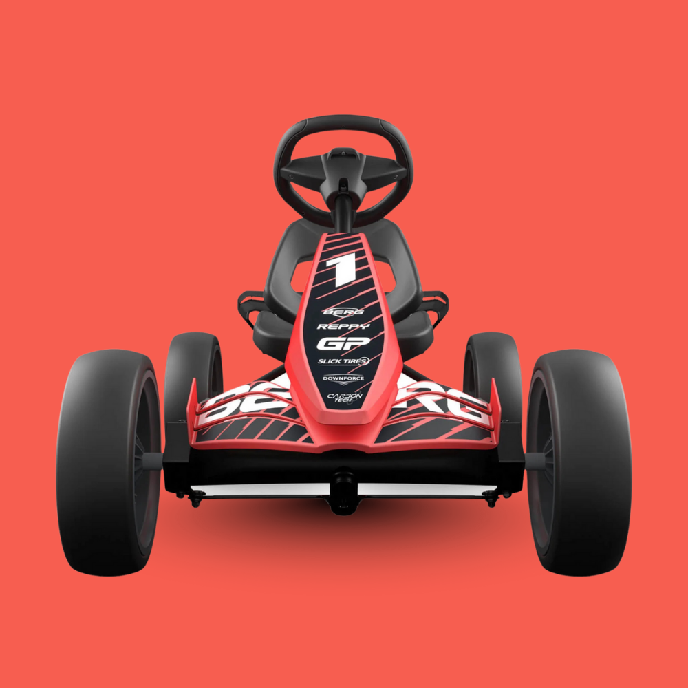 Red and black go-kart on a red background