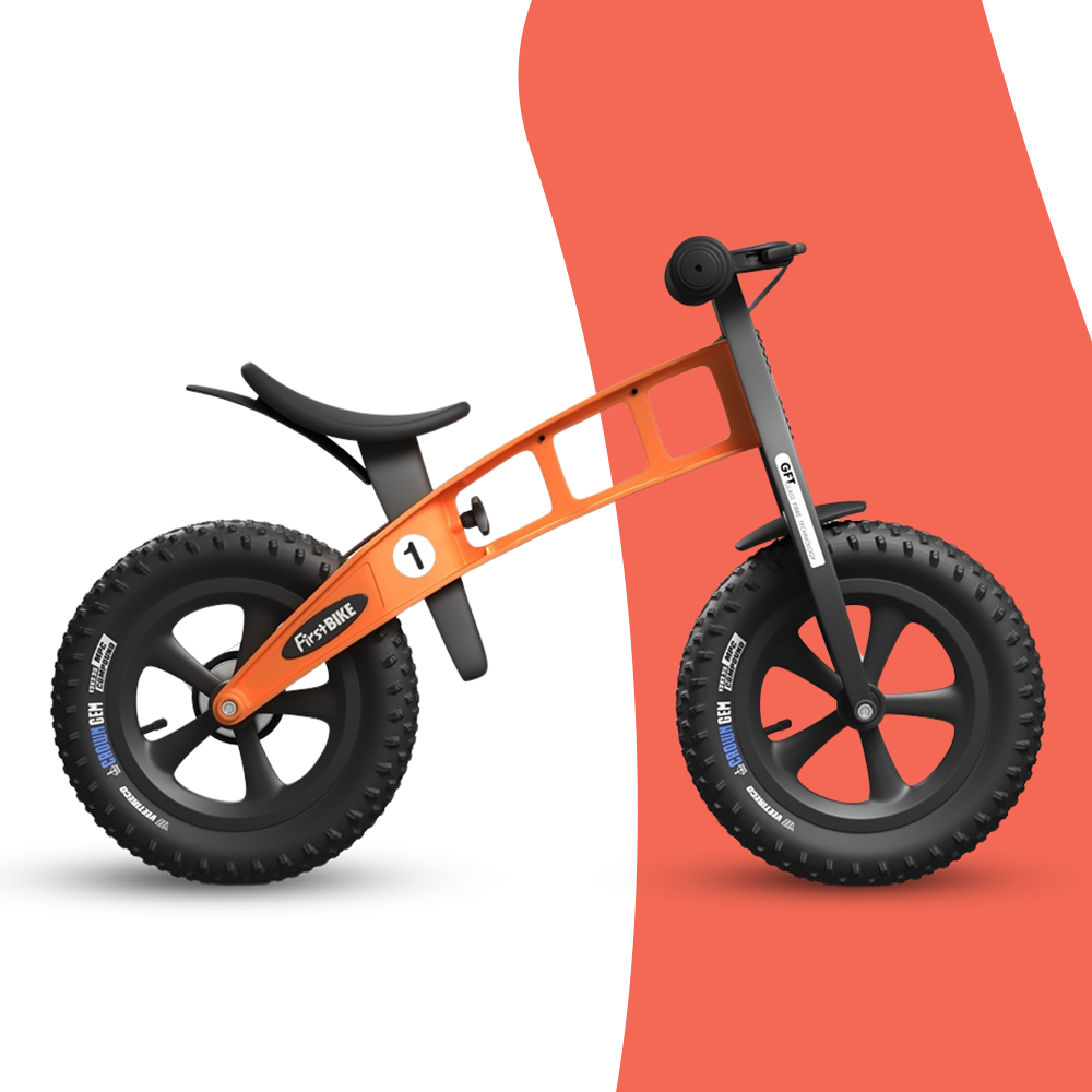 side view of FirstBIKE Lightweight Fat Cross Balance Bike With Brake - Orange