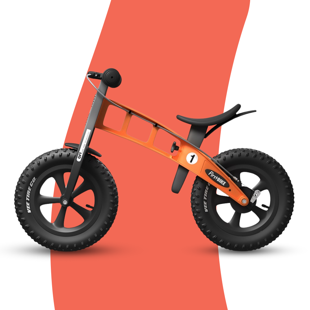 side view of FirstBIKE Lightweight Fat Cross Balance Bike With Brake - Orange