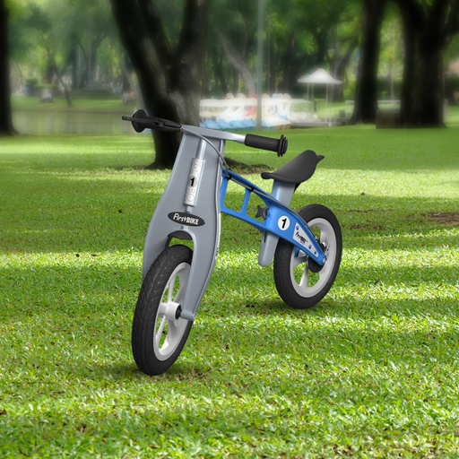 park view with the FirstBIKE Lightweight Street Balance Bike with Brake - Light Blue