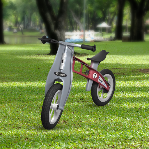 park view with the FirstBIKE Lightweight Street Balance Bike with Brake - Red