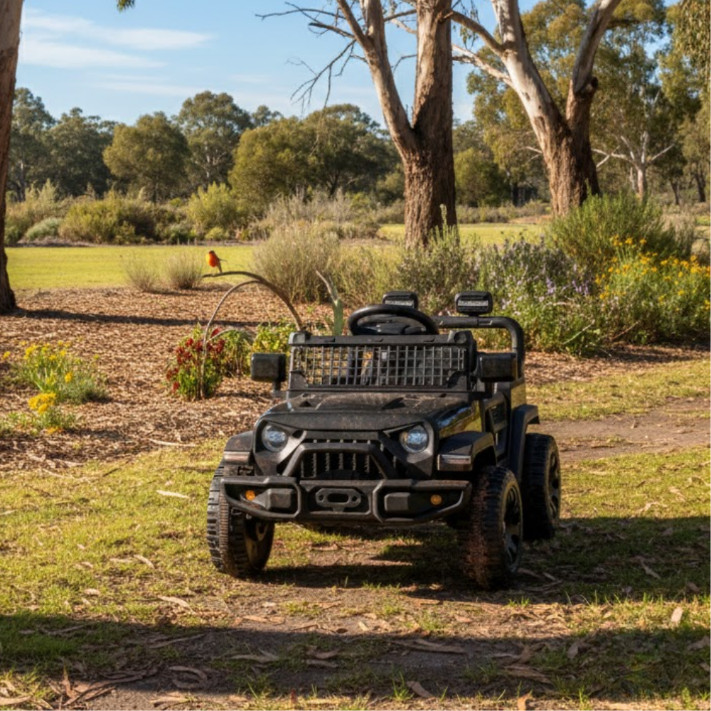 Children's toy off-road vehicle in a natural setting with trees and grass.