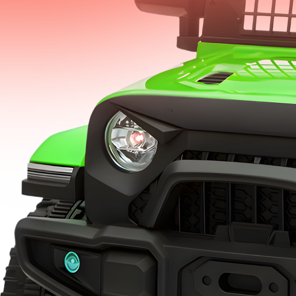 Close-up of a green and black off-road vehicle's front grille and headlight.