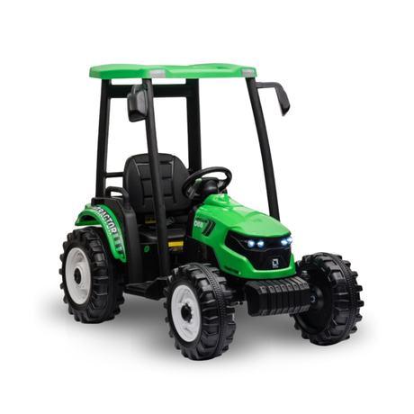 A green and black ride-on toy tractor with a small driver seat, black steering wheel, and roll-up canopy, shown on a clean white background.