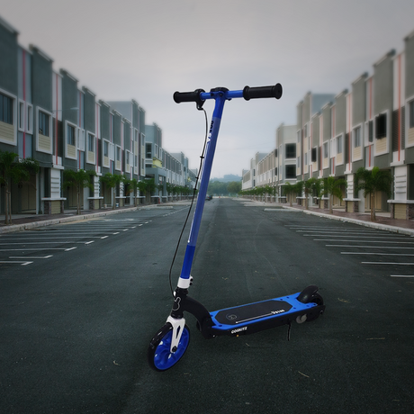 Lifestyle Shot: A photo of the scooter outdoors on an empty road, surrounded by modern architecture, emphasizing its urban usability and sleek design.