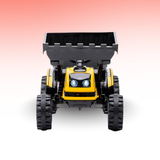 Toy dump truck with black bed and yellow body on a white background
