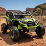 Green and black off-road vehicle on a dirt road with desert landscape in the background