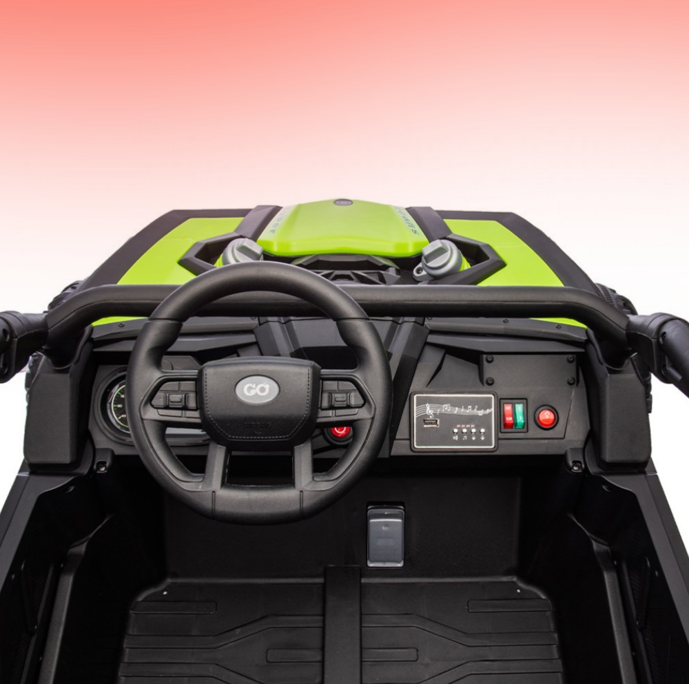 Close-up of a green and black toy car with steering wheel and dashboard on a gradient background