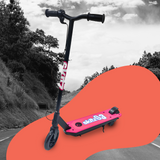 Scooter in Outdoor Setting (Black and White): A black-and-white photo of the scooter in a natural outdoor area, showcasing its adaptability for different terrains and conditions.