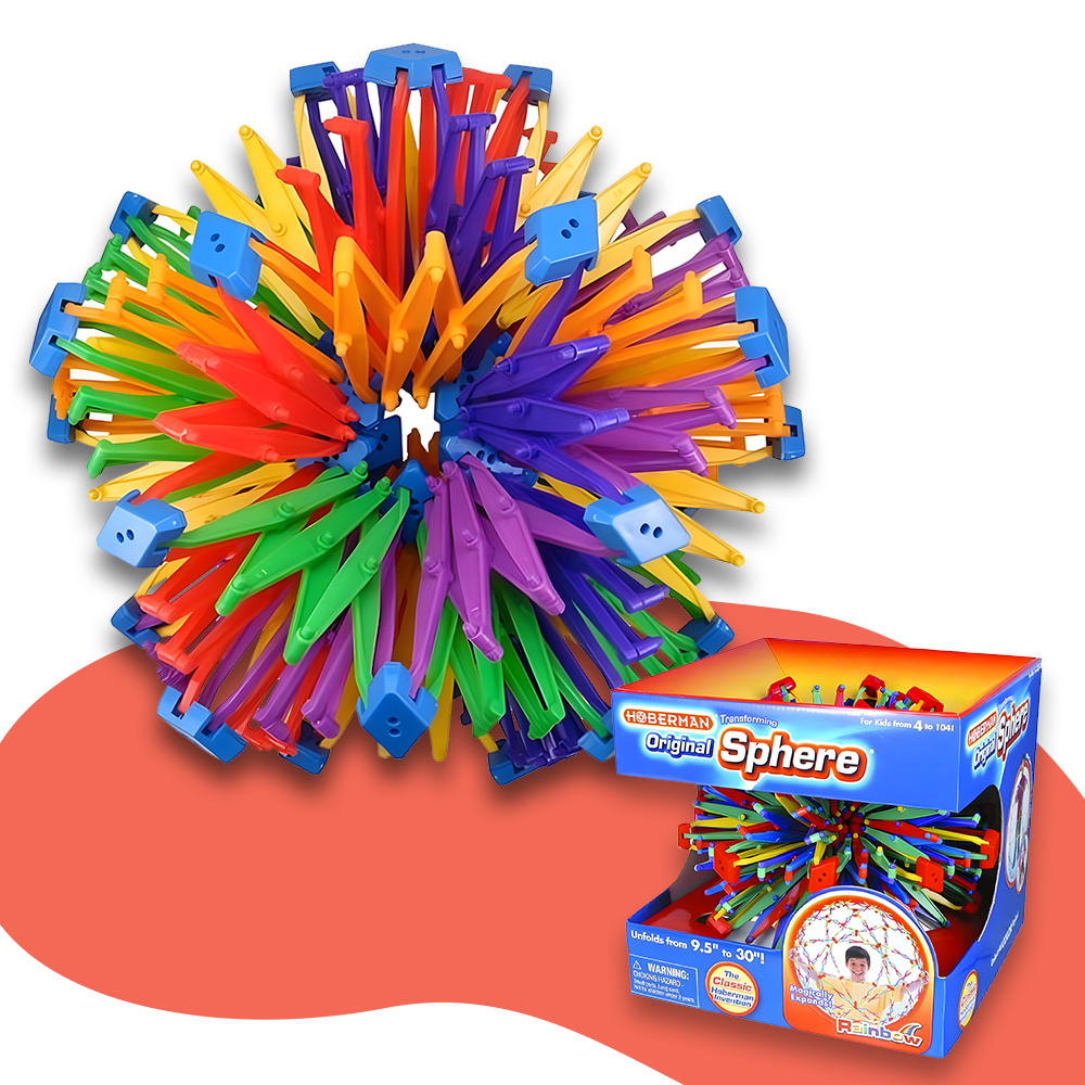 Rainbow-coloured Hoberman Sphere in a contracted state, with packaging displayed at the bottom right corner, placed against a red and white background