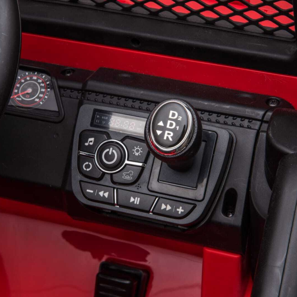 Close-up of a vehicle's control panel with buttons and dials on a red background