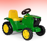Toy tractor with yellow seat and wheels on a white background