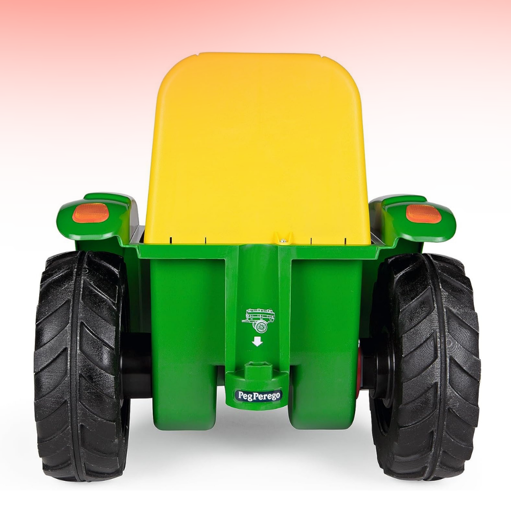 Toy tractor with a yellow bed and green body on a white background