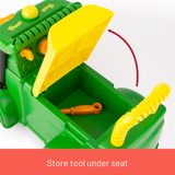 Toy construction vehicle with yellow tool stored under the green seat on a white background