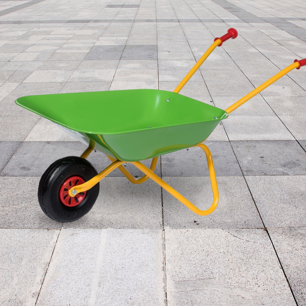 Colorful children's wheelbarrow on a tiled floor