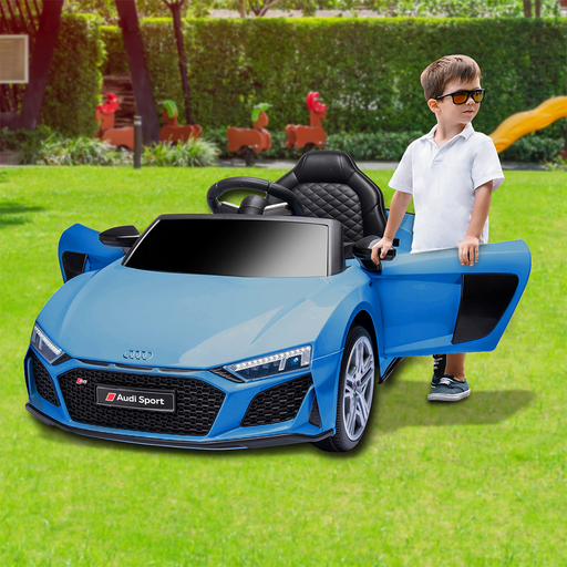 kid at the play yard with the Kahuna 12v Licensed Audi Sport Kids Electric Ride On with Remote - Blue