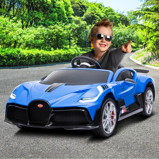 kid riding on blue electric ride on car