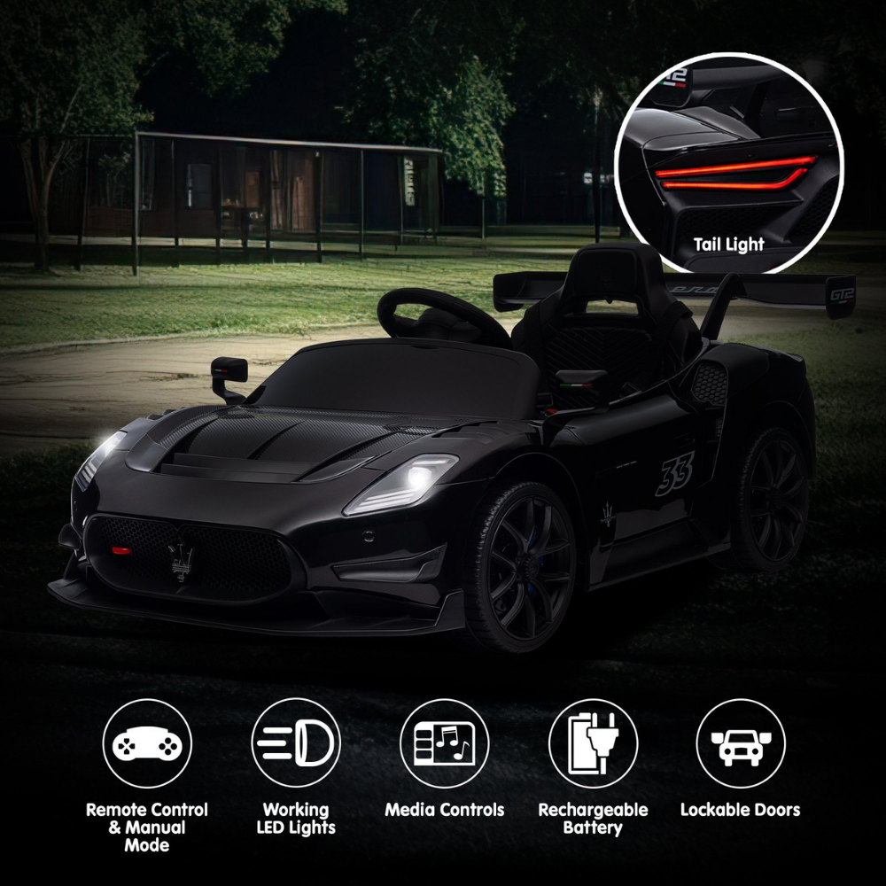 Black toy car with features highlighted on a dark background
