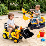 Two children playing with toy excavators in a sandy outdoor area.