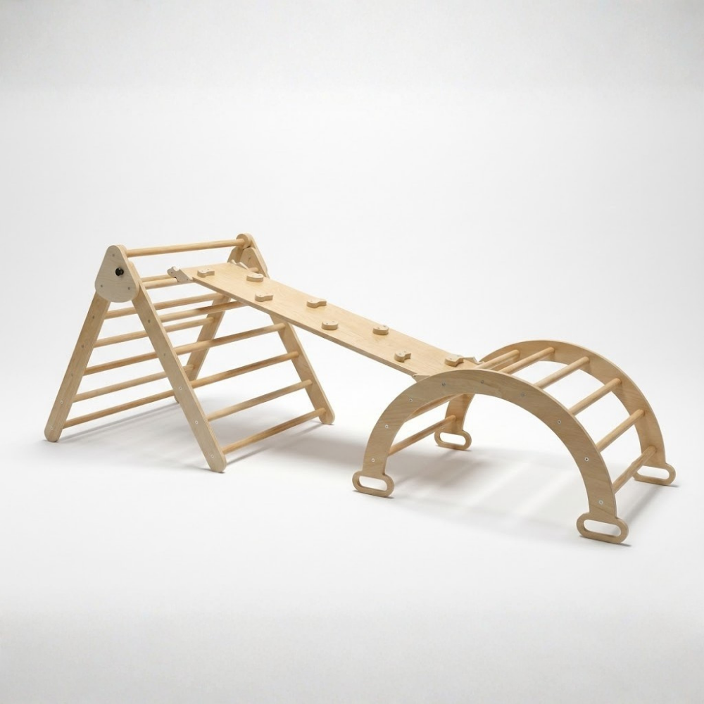 Wooden children's play structure with climbing wall and seesaw on a white background