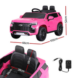 Size dimensions of the pink Chevrolet Tahoe-inspired ride-on electric car, with measurements and charger displayed.