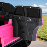 Close-up of the open door of the pink Chevrolet Tahoe-inspired ride-on electric car, highlighting the detailed interior design.