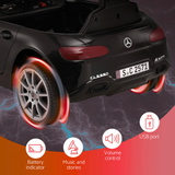 Black toy car with Mercedes-Benz logo on a dark background