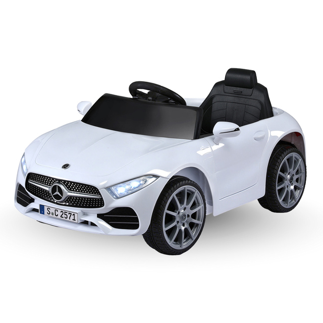 White toy car with black interior on a white background