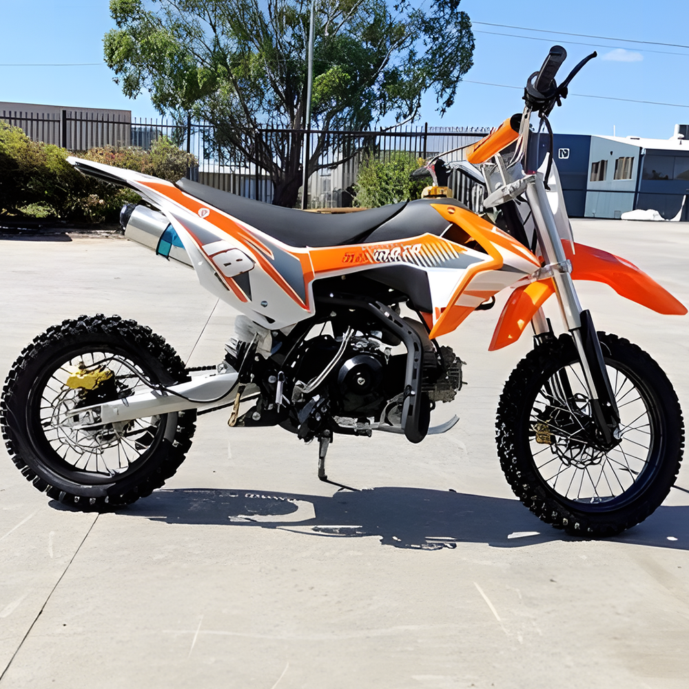 side view of MJM 110cc Petrol Powered 4-Stroke Kids Trail Pit Dirt Bike - Orange