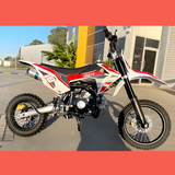 side view of MJM 110cc Petrol Powered 4-Stroke Kids Trail Pit Dirt Bike - Red