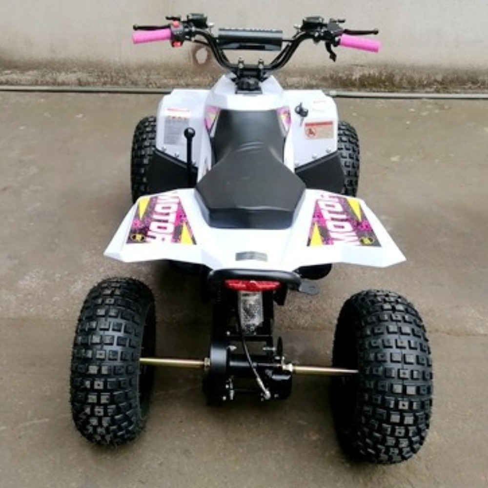 White ATV with pink handlebars on a concrete surface