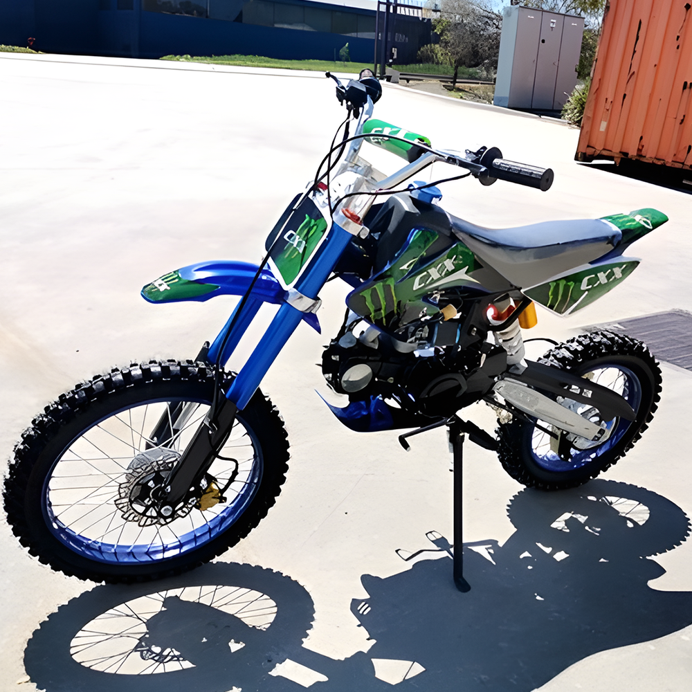 side view of MJM 125cc BigFoot Petrol Powered 4-Stroke Kids Dirt Bike - Blue