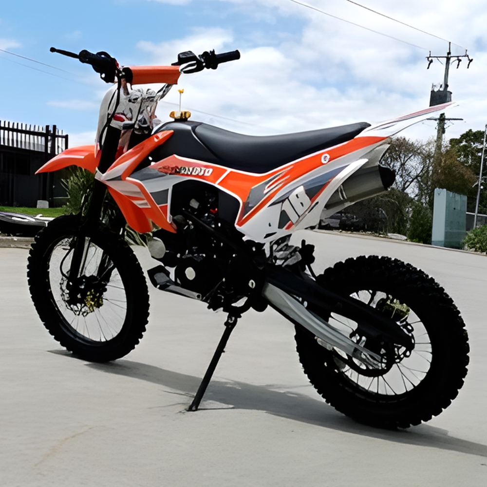 side view of MJM 125cc Petrol Powered 4-Stroke E-Start Kids Dirt Bike - Orange