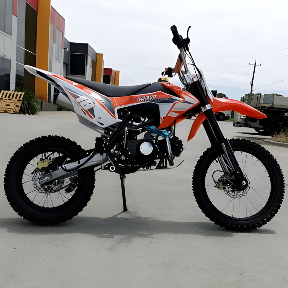 side view of MJM 125cc Petrol Powered 4-Stroke E-Start Kids Dirt Bike - Orange