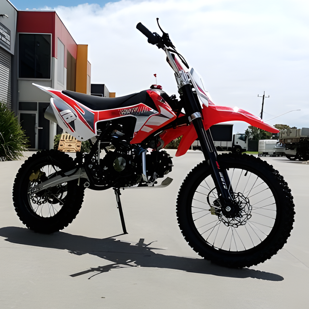 side view of MJM 125cc Petrol Powered 4-Stroke E-Start Kids Dirt Bike - Red