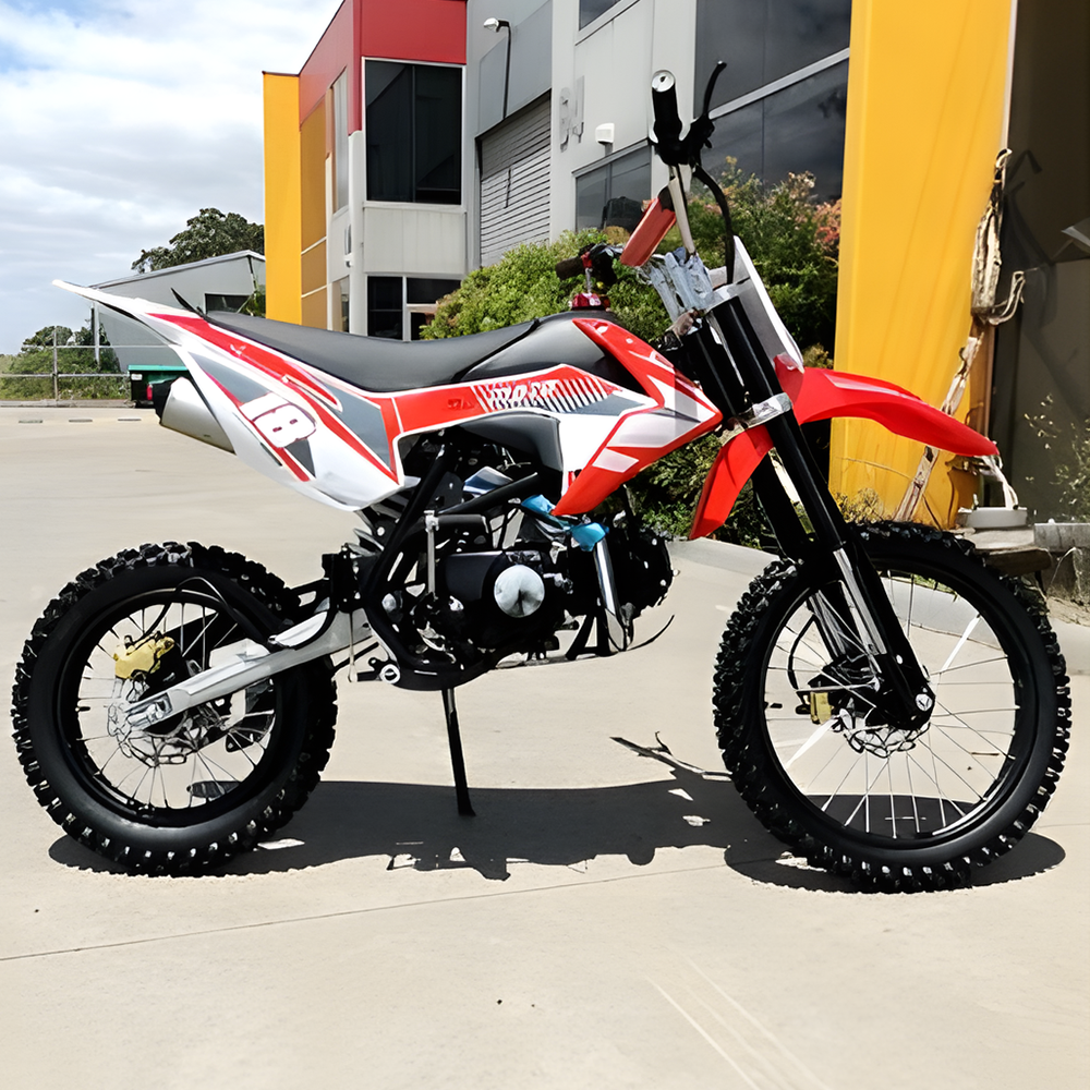 side view of MJM 125cc Petrol Powered 4-Stroke E-Start Kids Dirt Bike - Red