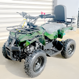 Green and gray ATV on a concrete surface with a white wall in the background